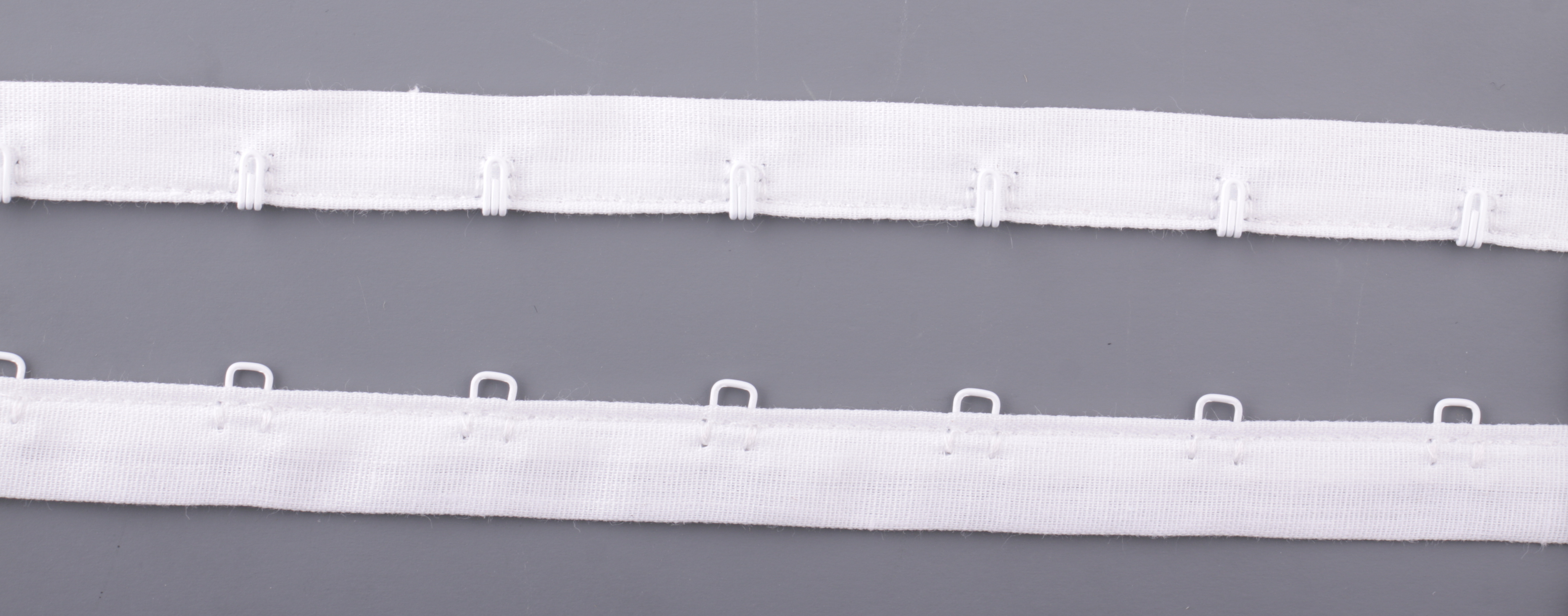 Cotton-poly hook & eye tape, on edge, standard fasteners